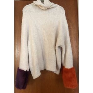 Sweater with colored fur